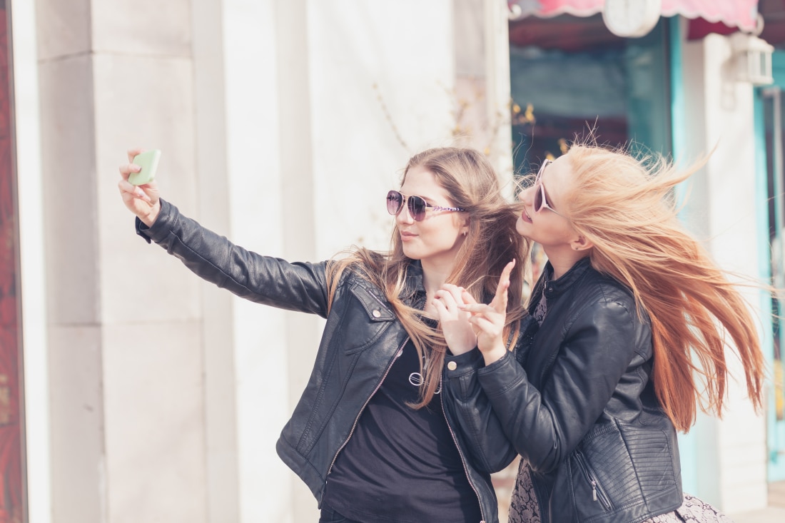Two Happy Friends Girl Taking A Selfie Outside